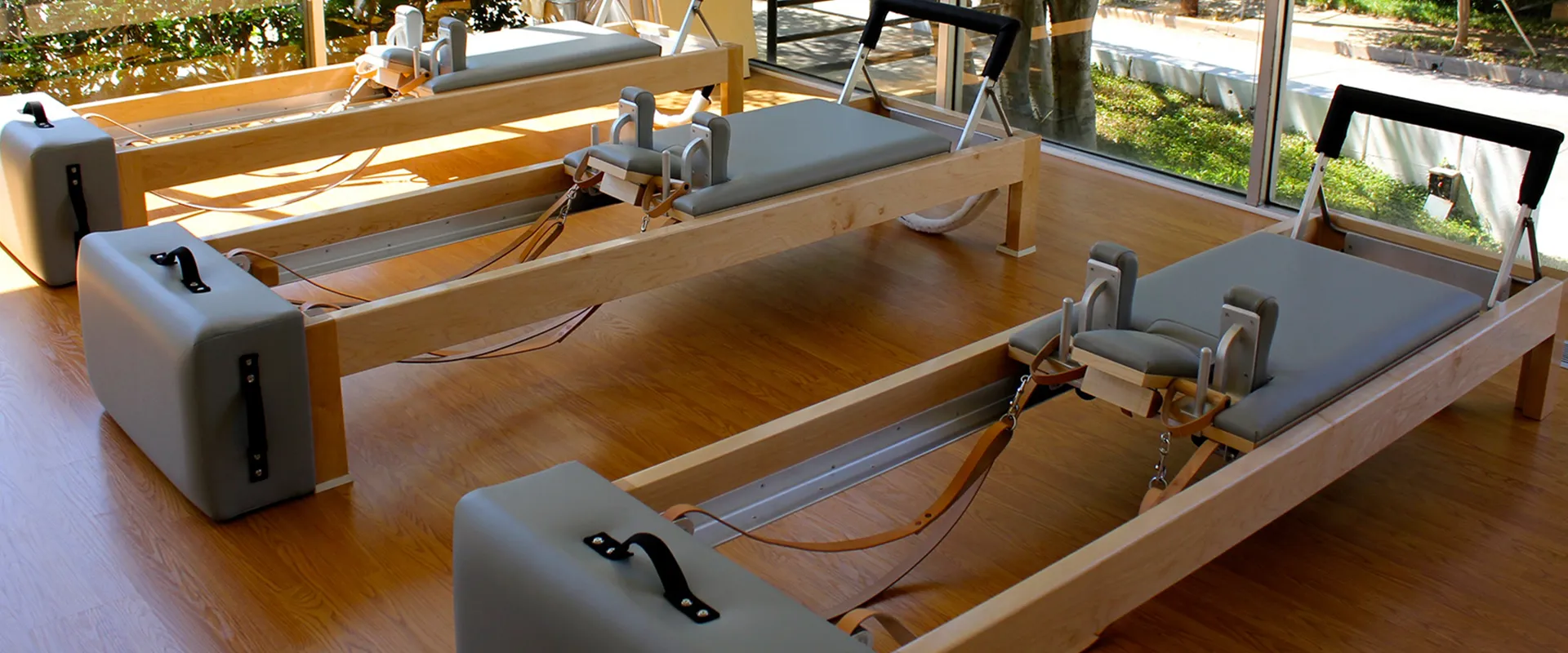 A light-filled Pilates studio in Uptown Dallas with a Reformer